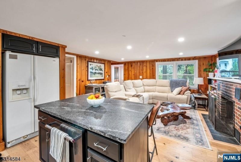 41 Bellot Road Ringwood, NJ 07456 - Photo 2 of 14 a living room with furniture a large window and a table