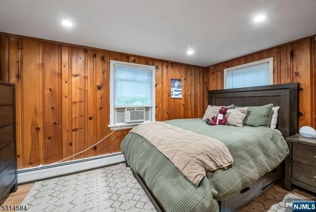 a spacious bedroom with a large bed and closet