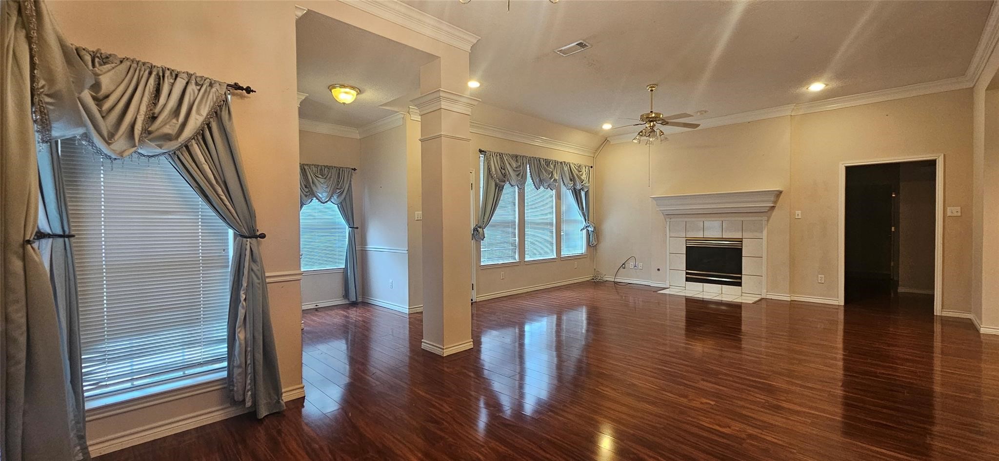 1903 North Travis Street Liberty, TX 77575 - Photo 2 of 13 a view of entryway and hall with wooden floor