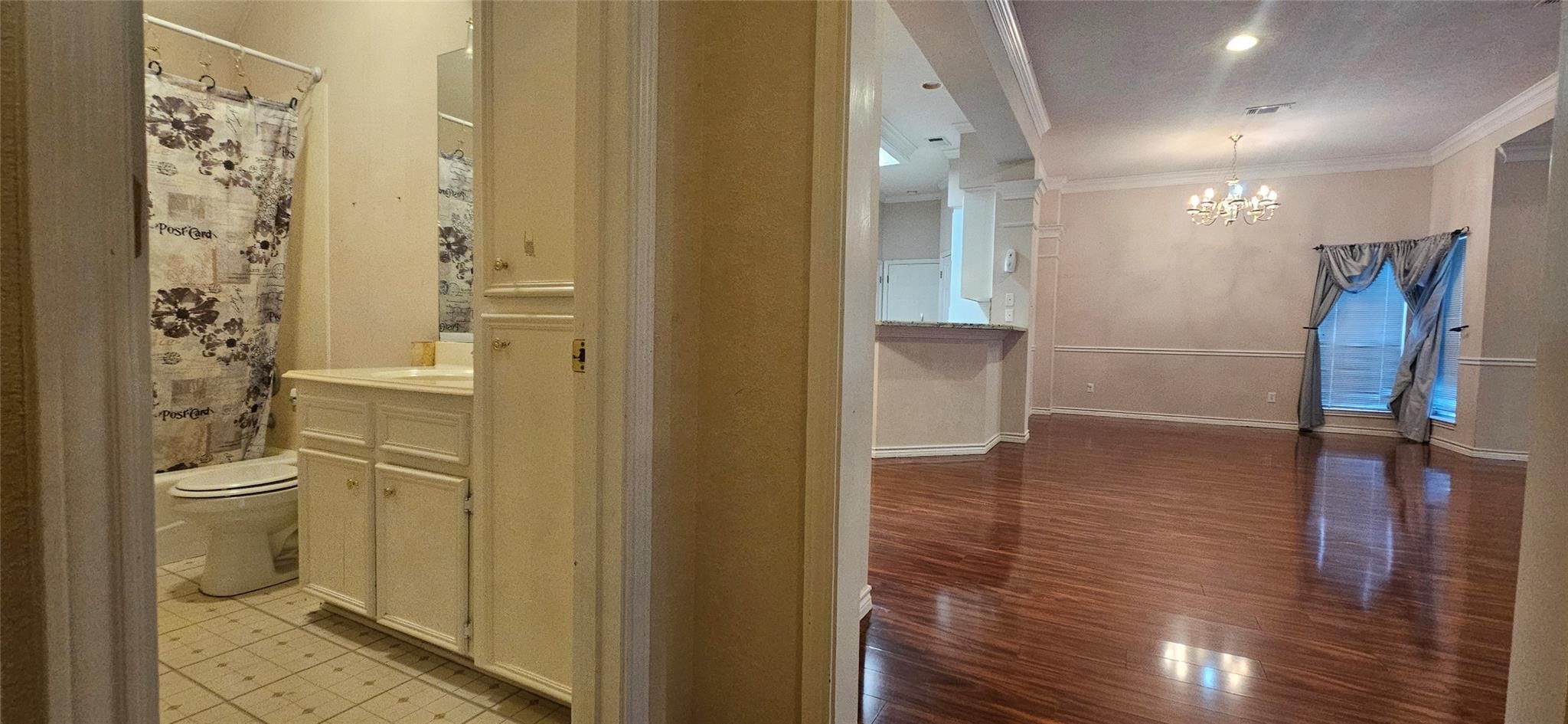 1903 North Travis Street Liberty, TX 77575 - Photo 10 of 13 a bathroom with a shower and a toilet