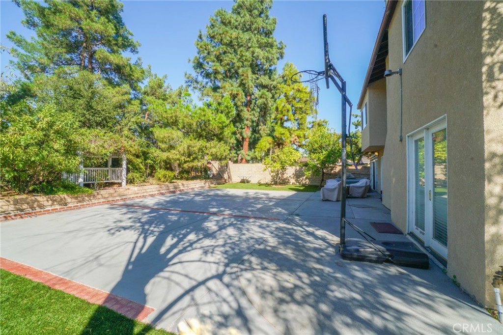 19259 Kenya Street Porter Ranch, CA 91326 - Photo 18 of 31 a view of a yard with plants and trees