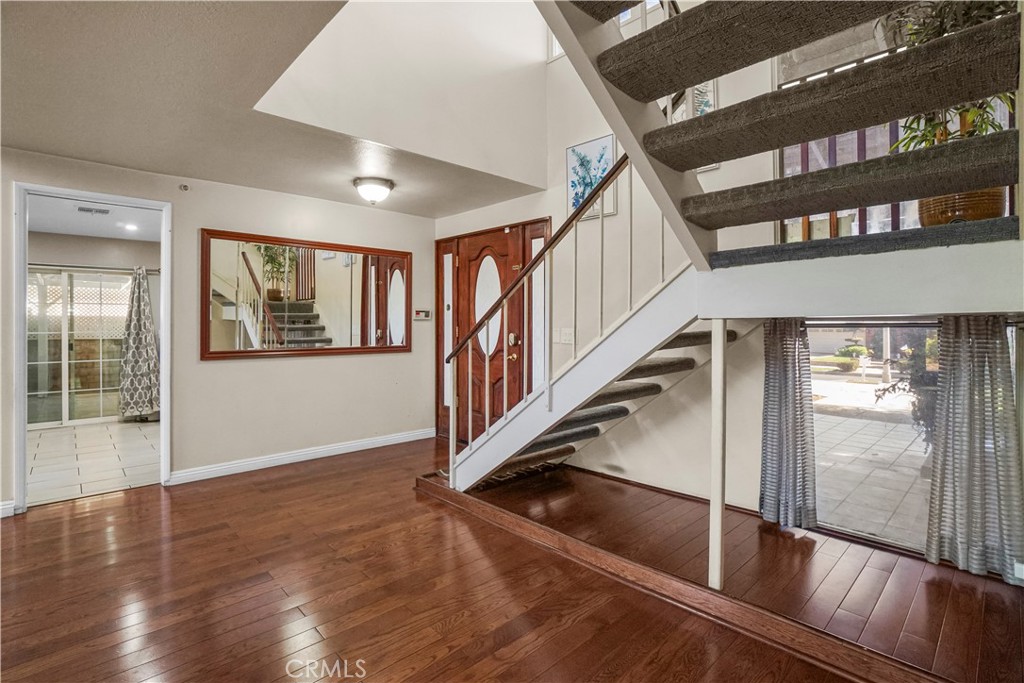 19259 Kenya Street Porter Ranch, CA 91326 - Photo 24 of 31 a view of entryway and hall with wooden floor
