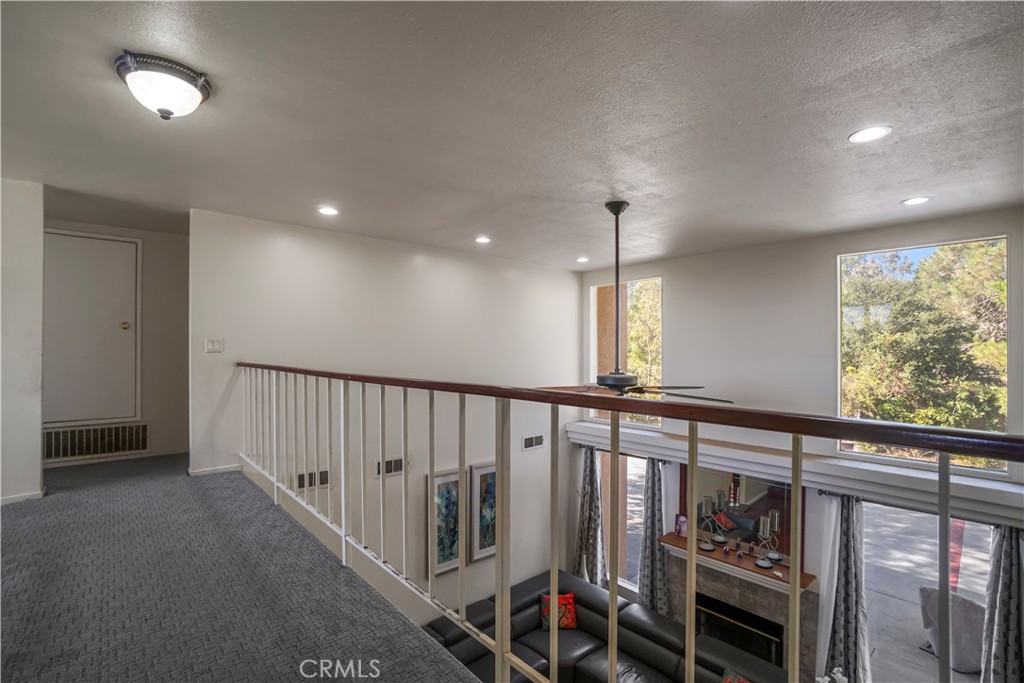 19259 Kenya Street Porter Ranch, CA 91326 - Photo 25 of 31 a view of a hallway with stairs