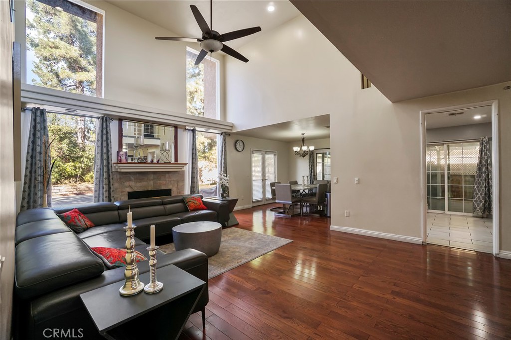 19259 Kenya Street Porter Ranch, CA 91326 - Photo 27 of 31 a living room with furniture and wooden floor