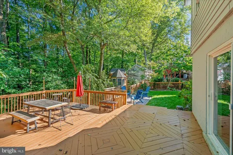 a view of outdoor space yard deck patio and outdoor kitchen