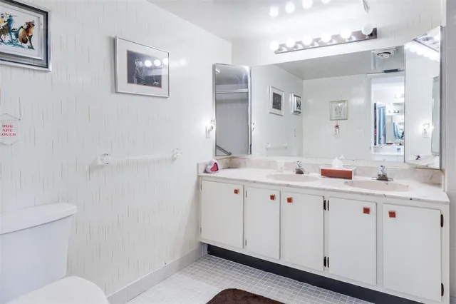 a bathroom with a shower and a shower head