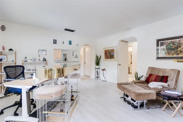 a living room with furniture and a couch