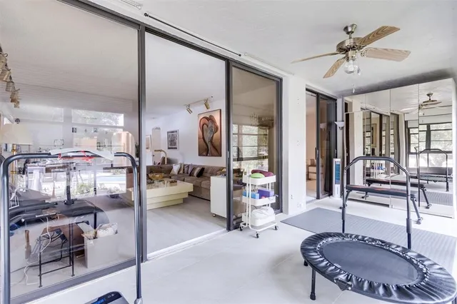 a view of a house with beach and lake view