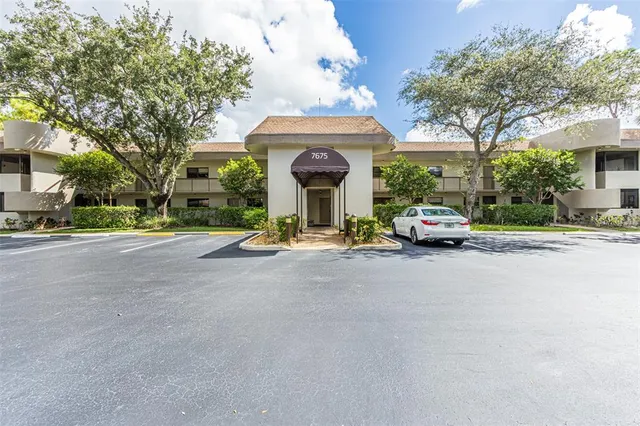a view of swimming pool with a patio