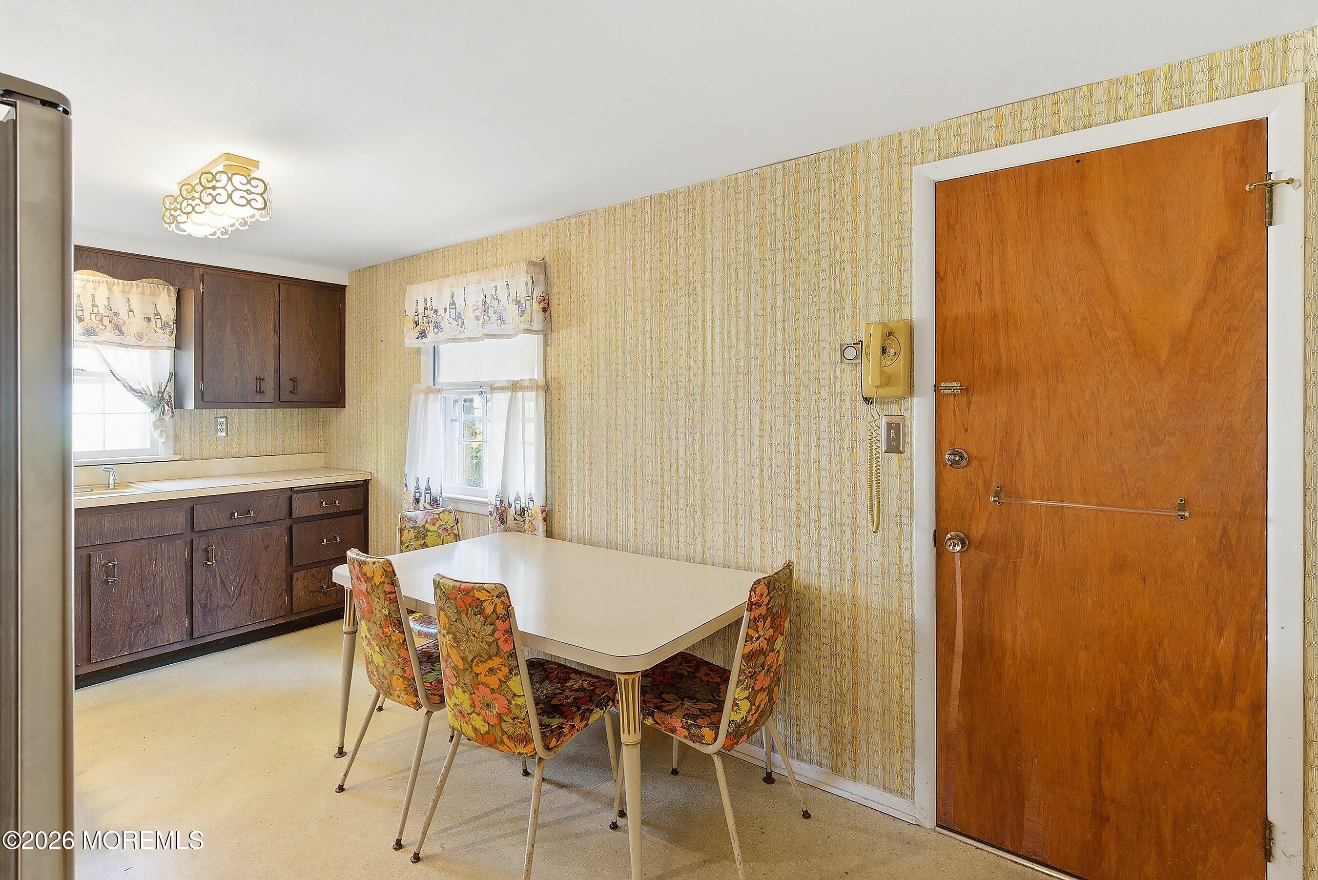 464 Newport Road Forked River, NJ 08731 - Photo 9 of 23 a view of a dining room with furniture and window