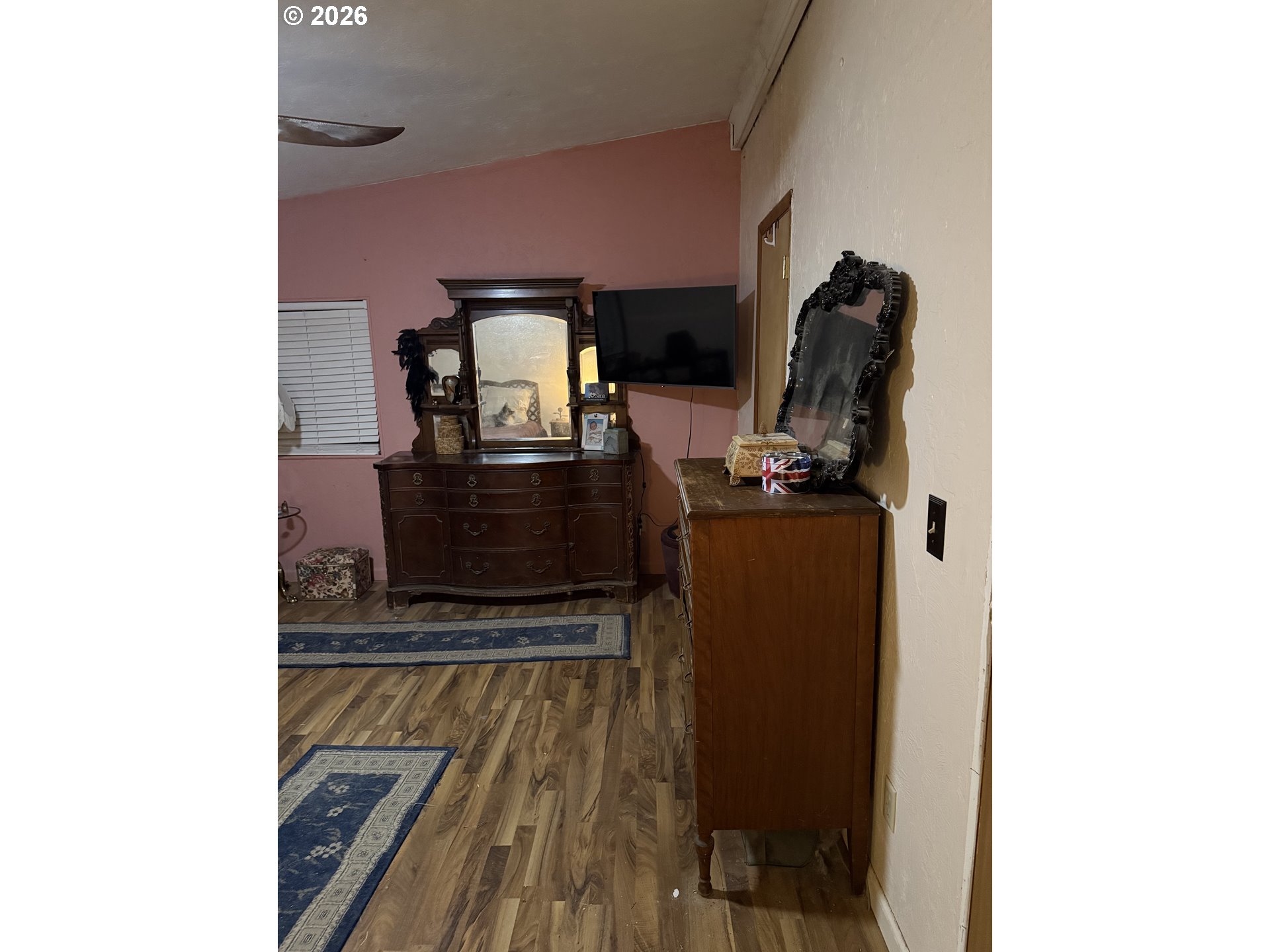24710 Judy Lane Monroe, OR 97456 - Photo 11 of 14 a view of a hallway with wooden floor and furniture