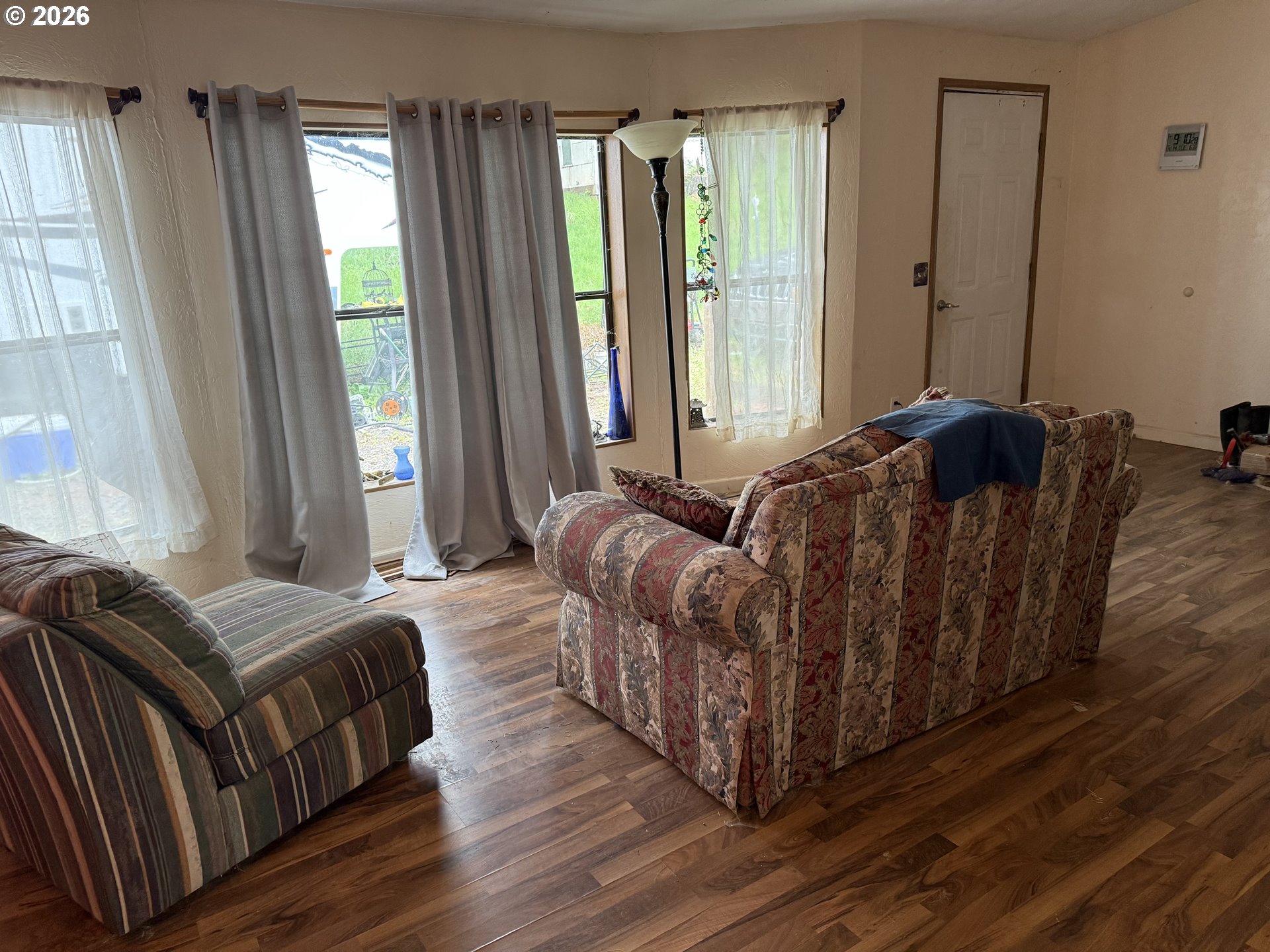 24710 Judy Lane Monroe, OR 97456 - Photo 12 of 14 a bedroom with two beds and large windows