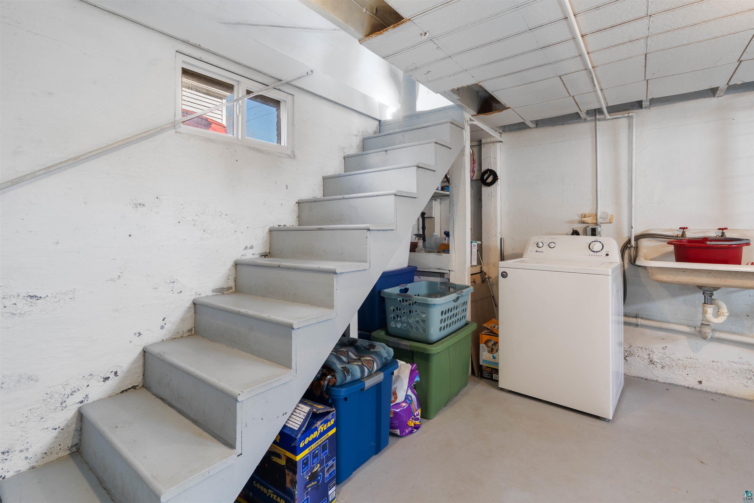 809 Prospect Avenue Cloquet, MN 55720 - Photo 16 of 20 Basement with washer / dryer and stairway