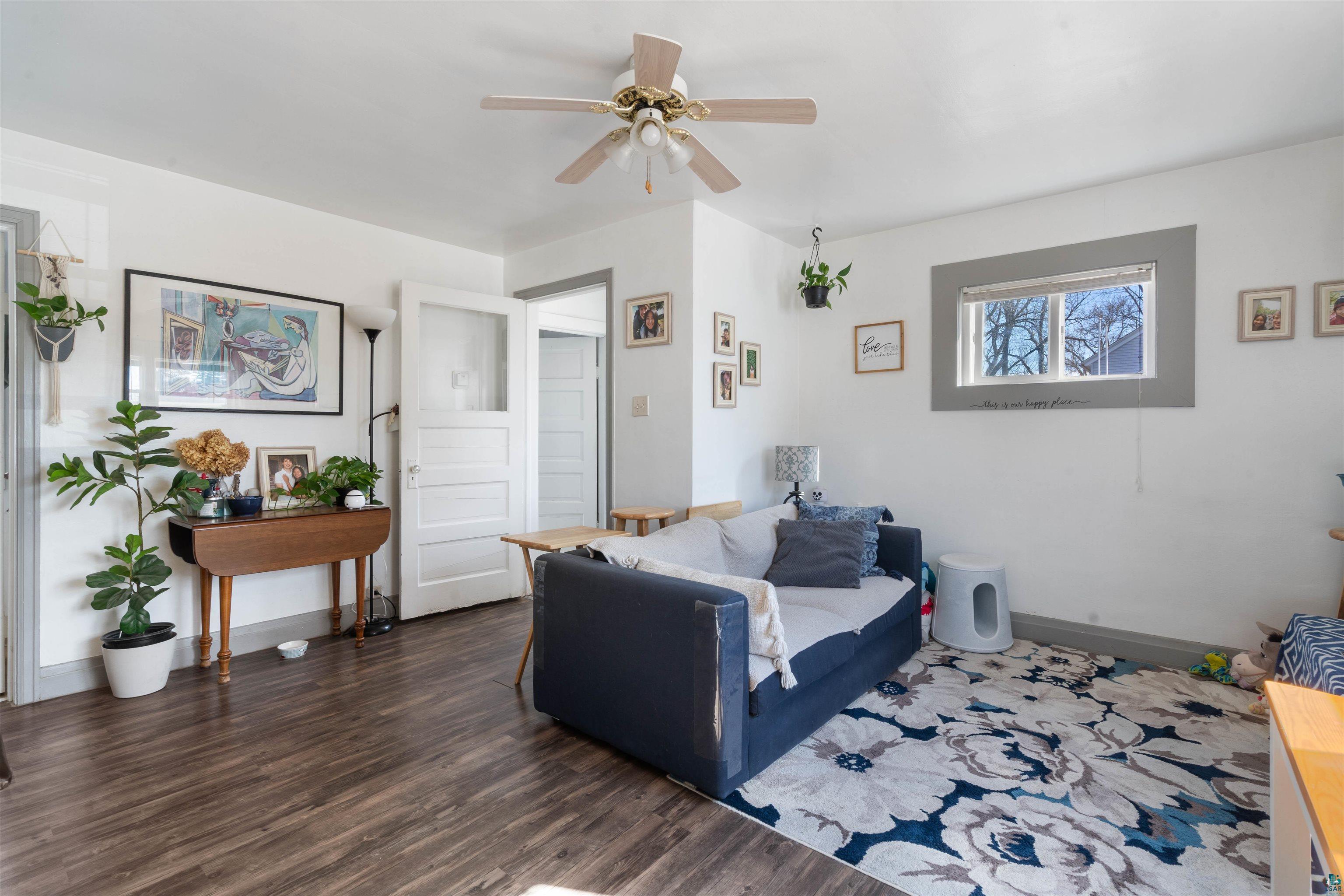 809 Prospect Avenue Cloquet, MN 55720 - Photo 7 of 20 Living area with ceiling fan and wood finished floors