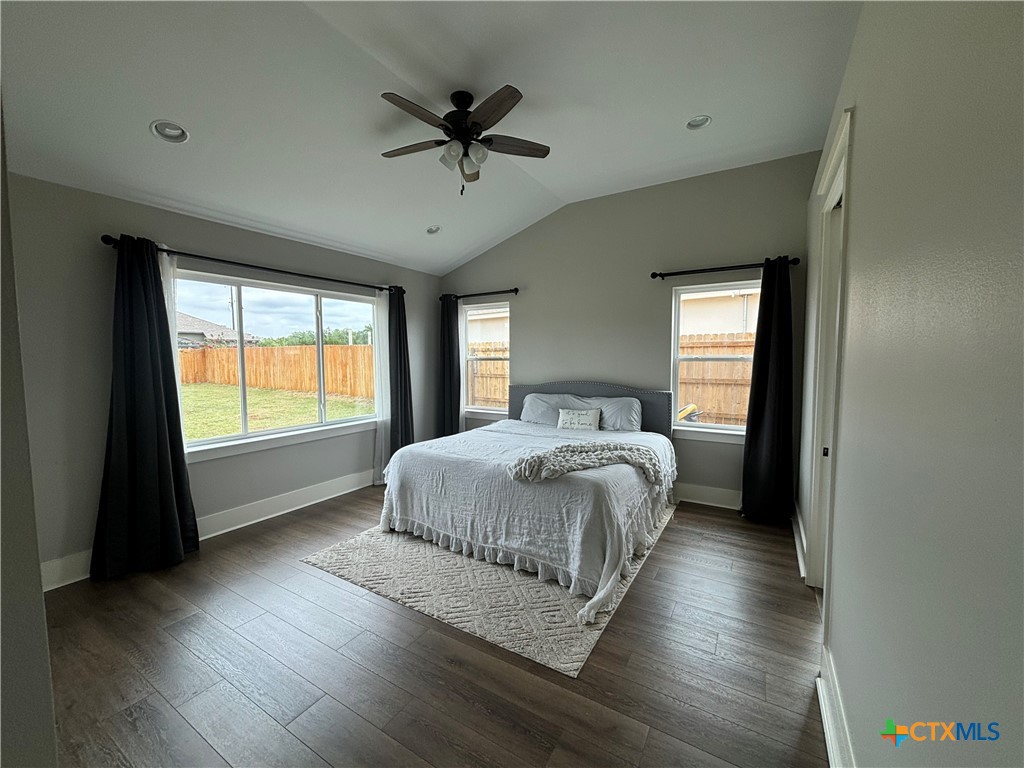 110 Hiram Cook Blanco, TX 78606 - Photo 36 of 46 a bedroom with a large bed and a window