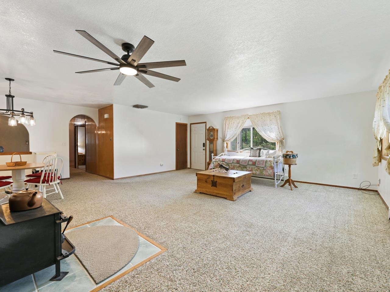 3694 F Road Palisade, CO 81526 - Photo 12 of 42 a living room with furniture and a window