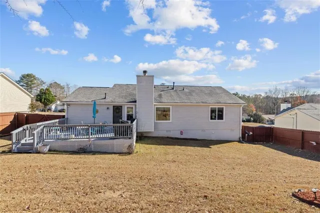 a house view with a garden space