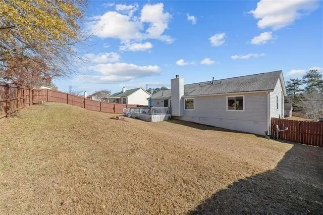 a view of backyard of a house