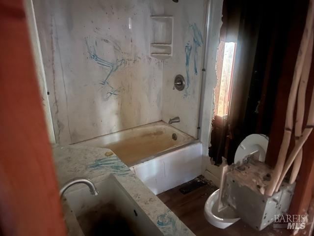 4593 Dry Creek Road Napa, CA 94558 - Photo 5 of 11 a bath tub sitting next to a bathroom sink