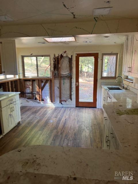 4593 Dry Creek Road Napa, CA 94558 - Photo 7 of 11 a view of empty room with wooden floor