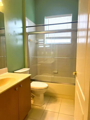 a bathroom with a sink and a shower