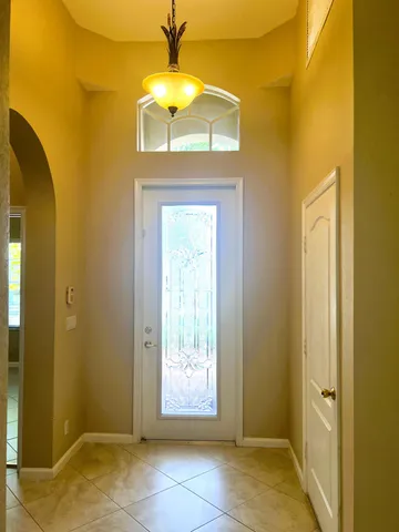 a view of an entryway with a door