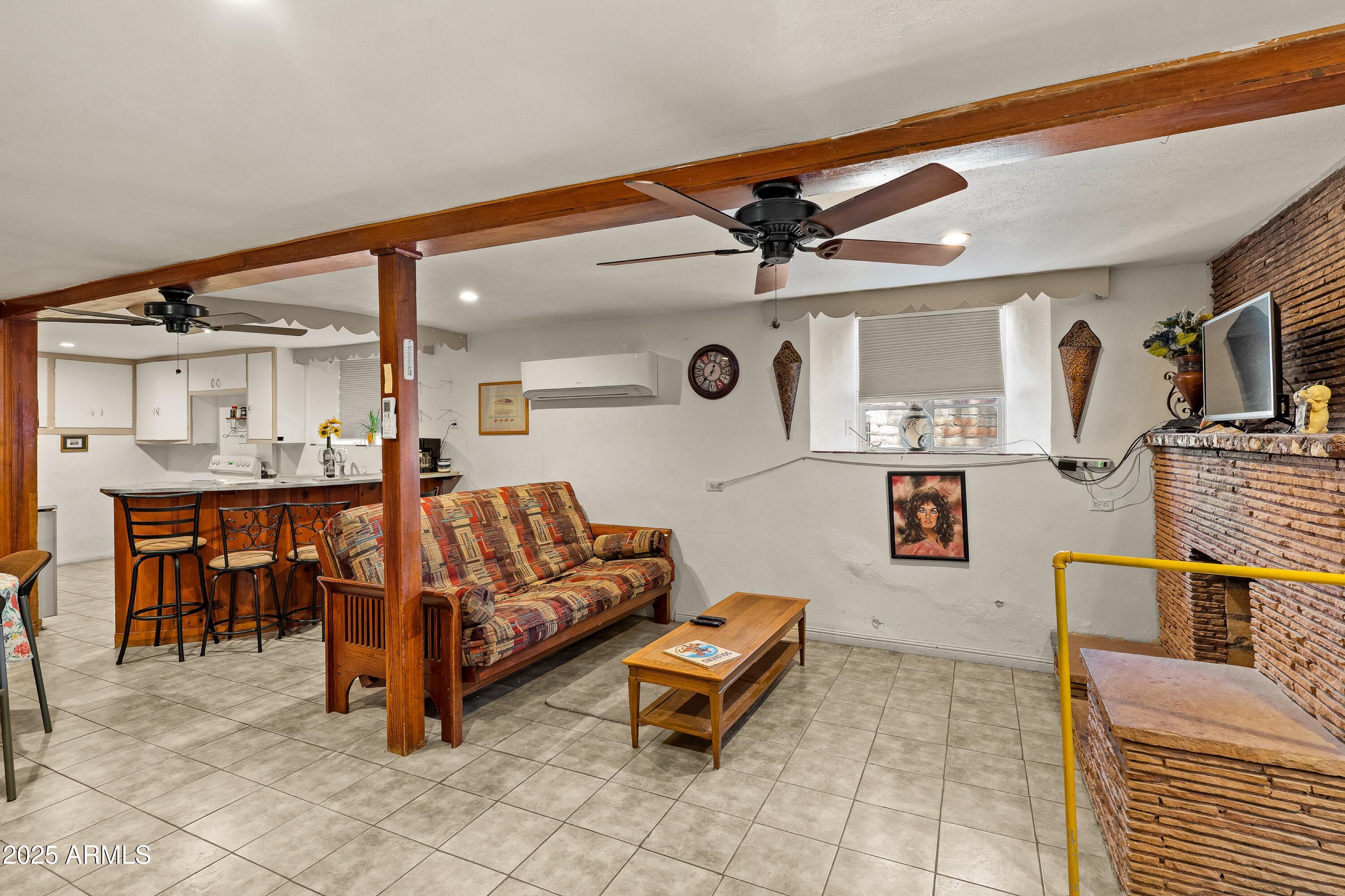 116 North 3rd Street Tombstone, AZ 85638 - Photo 20 of 64 a living room with furniture and a table