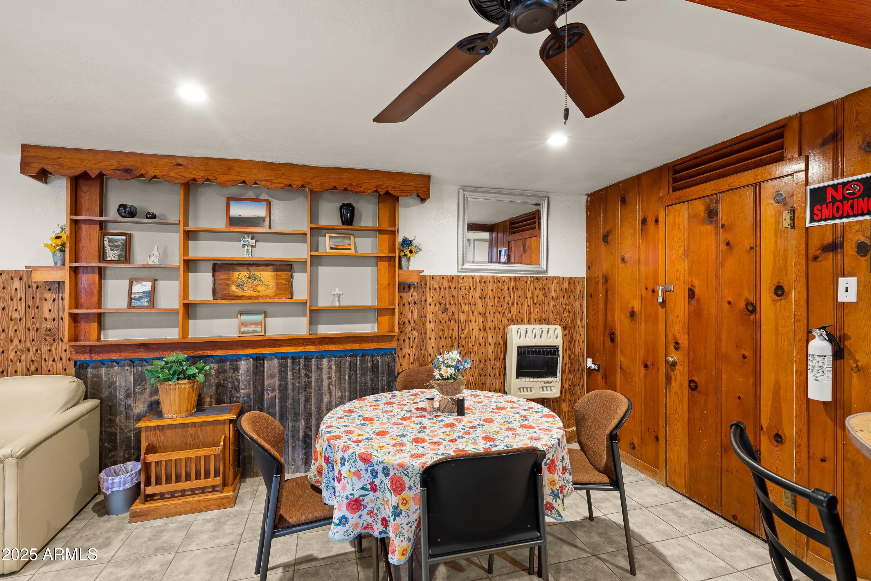 116 North 3rd Street Tombstone, AZ 85638 - Photo 23 of 64 a bedroom with furniture and a chandelier