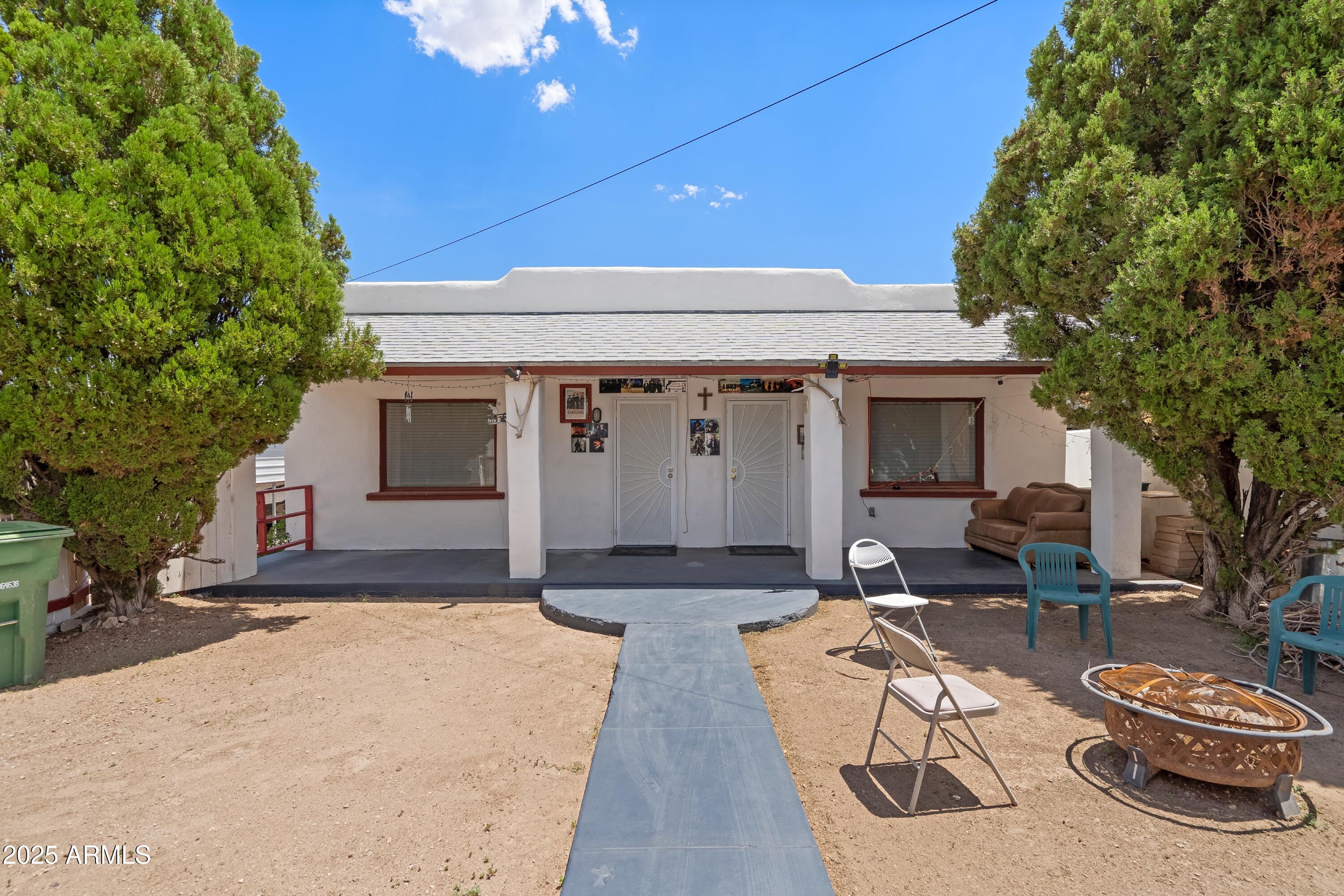 116 North 3rd Street Tombstone, AZ 85638 - Photo 56 of 64 a front view of a house with patio