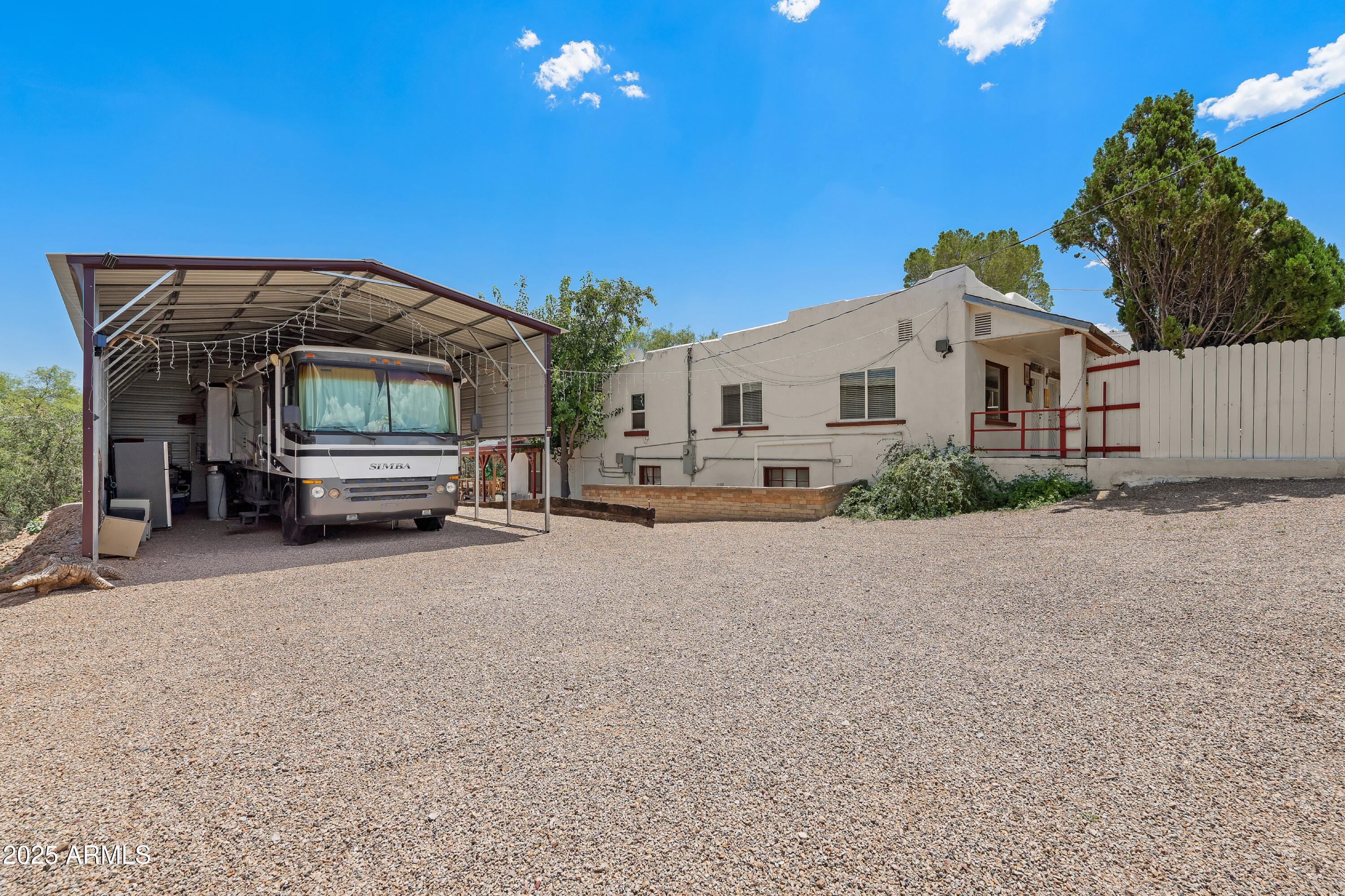 116 North 3rd Street Tombstone, AZ 85638 - Photo 8 of 64 a car parked in front of house