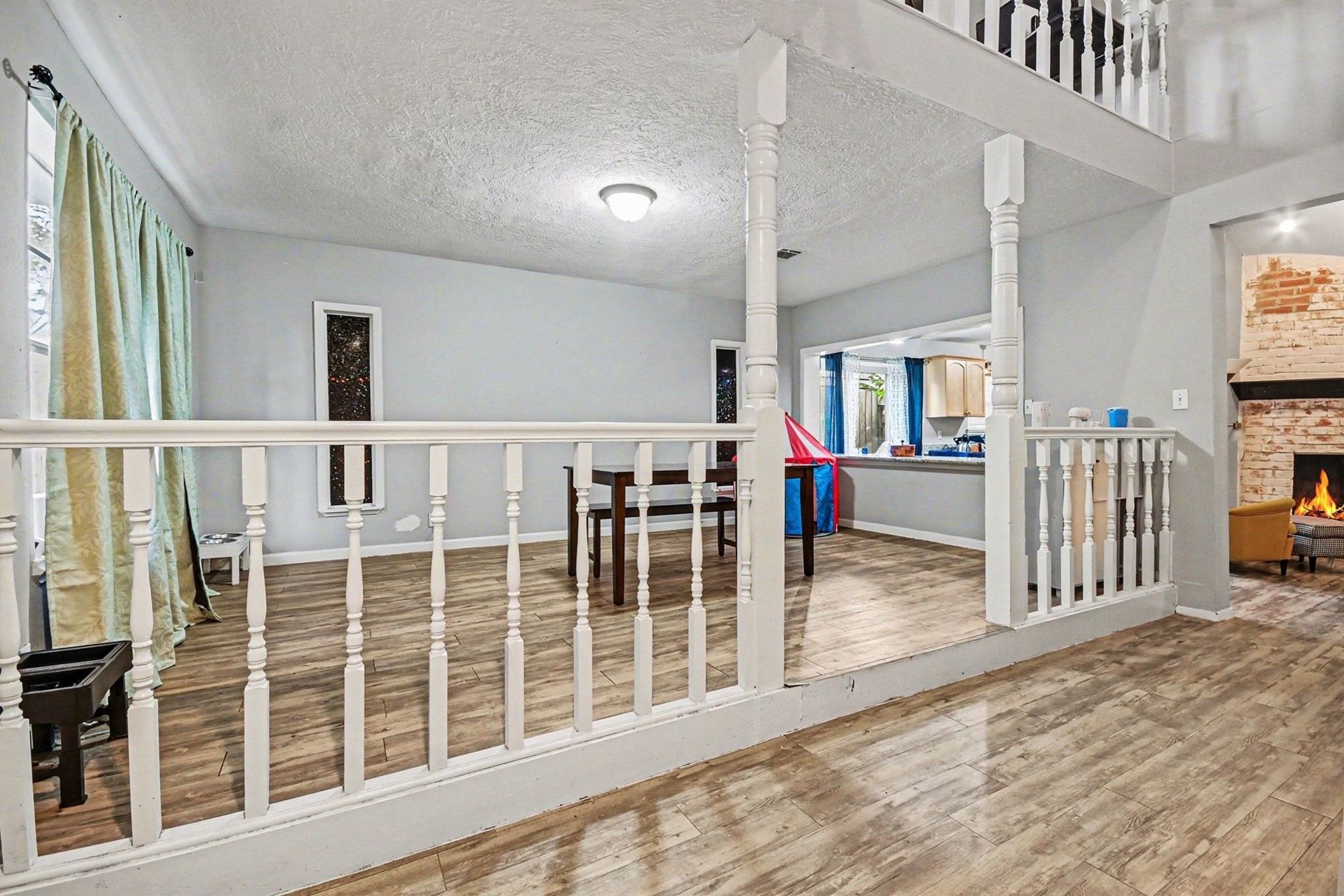 1339 Macclesby Lane Channelview, TX 77530 - Photo 14 of 21 a view of a livingroom with wooden floor and windows