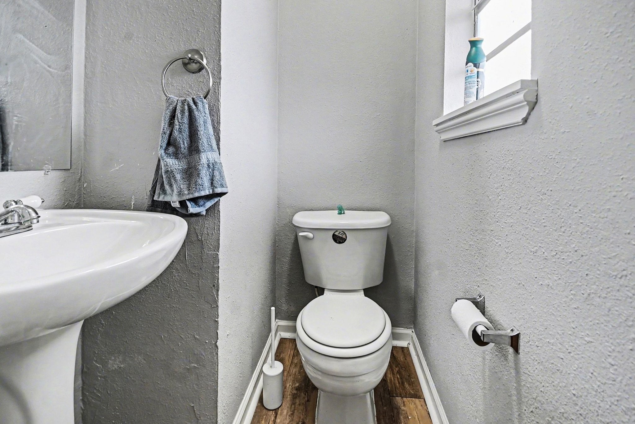 1339 Macclesby Lane Channelview, TX 77530 - Photo 16 of 21 a bathroom with a sink a toilet and a mirror
