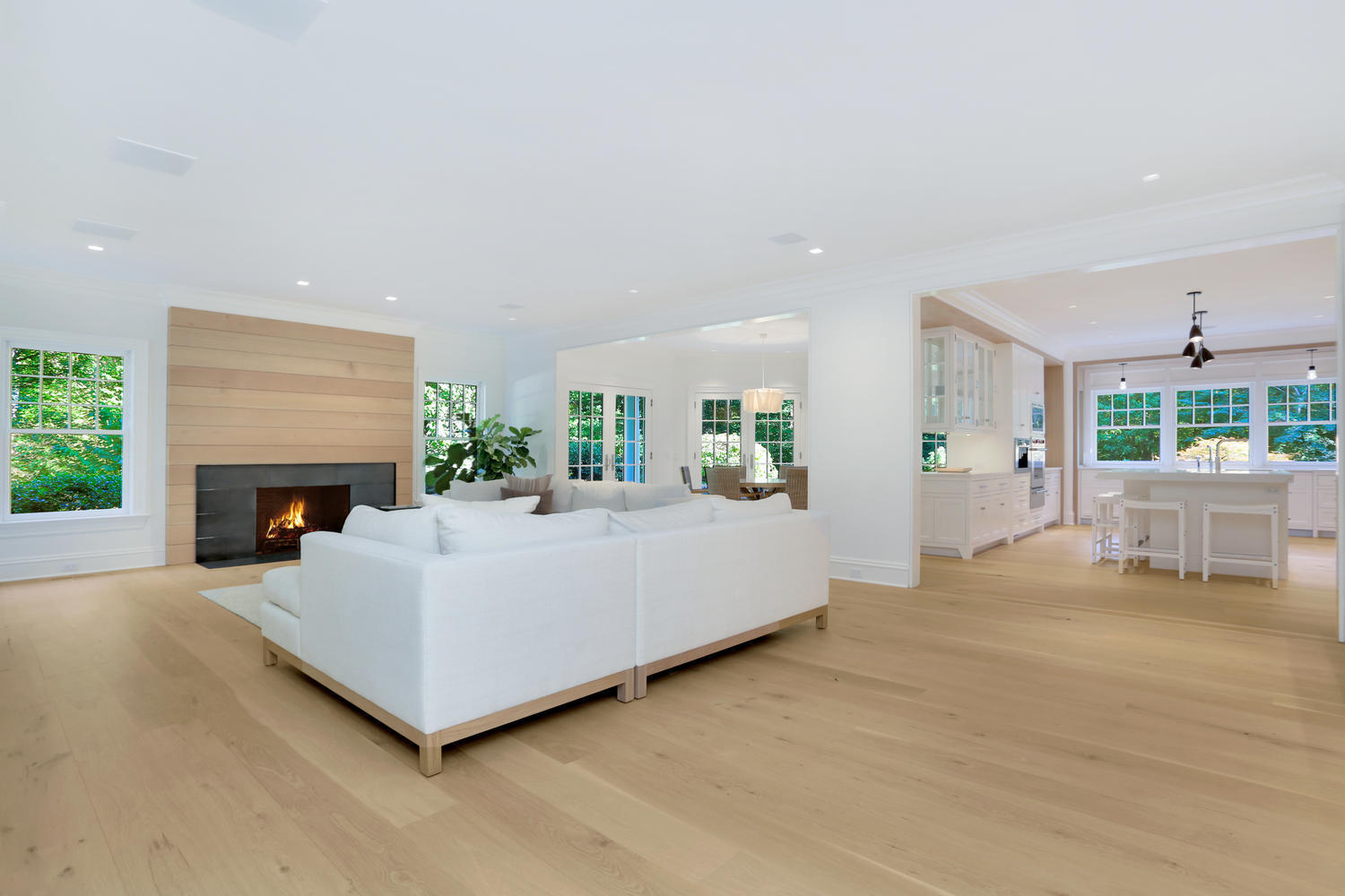 85 Lukes Wood Road New Canaan, CT 06840 - Photo 11 of 40 a living room with furniture and a fireplace