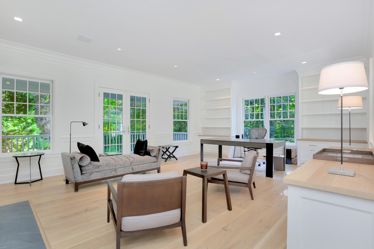 85 Lukes Wood Road New Canaan, CT 06840 - Photo 13 of 40 a living room with furniture and a large window