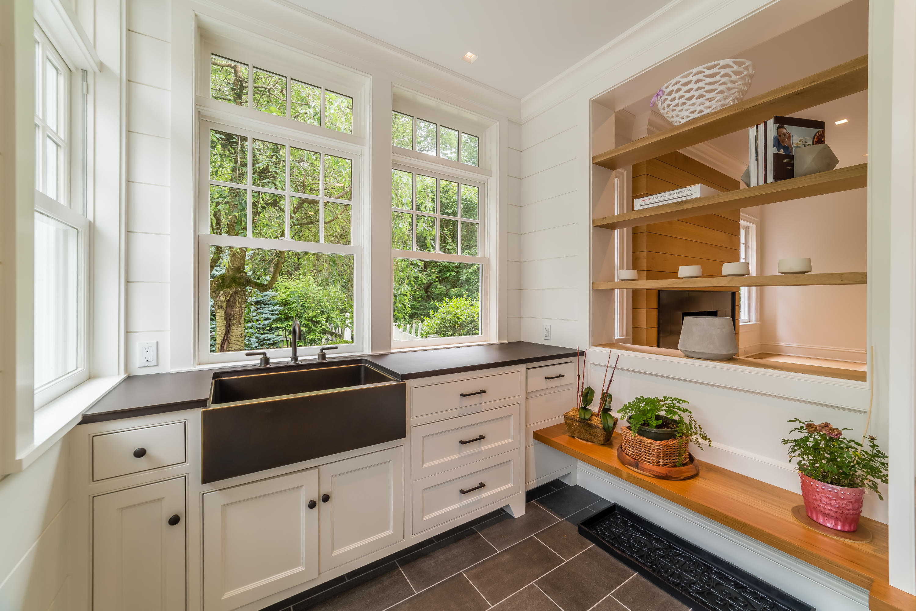85 Lukes Wood Road New Canaan, CT 06840 - Photo 17 of 40 a kitchen that has a lot of windows in it