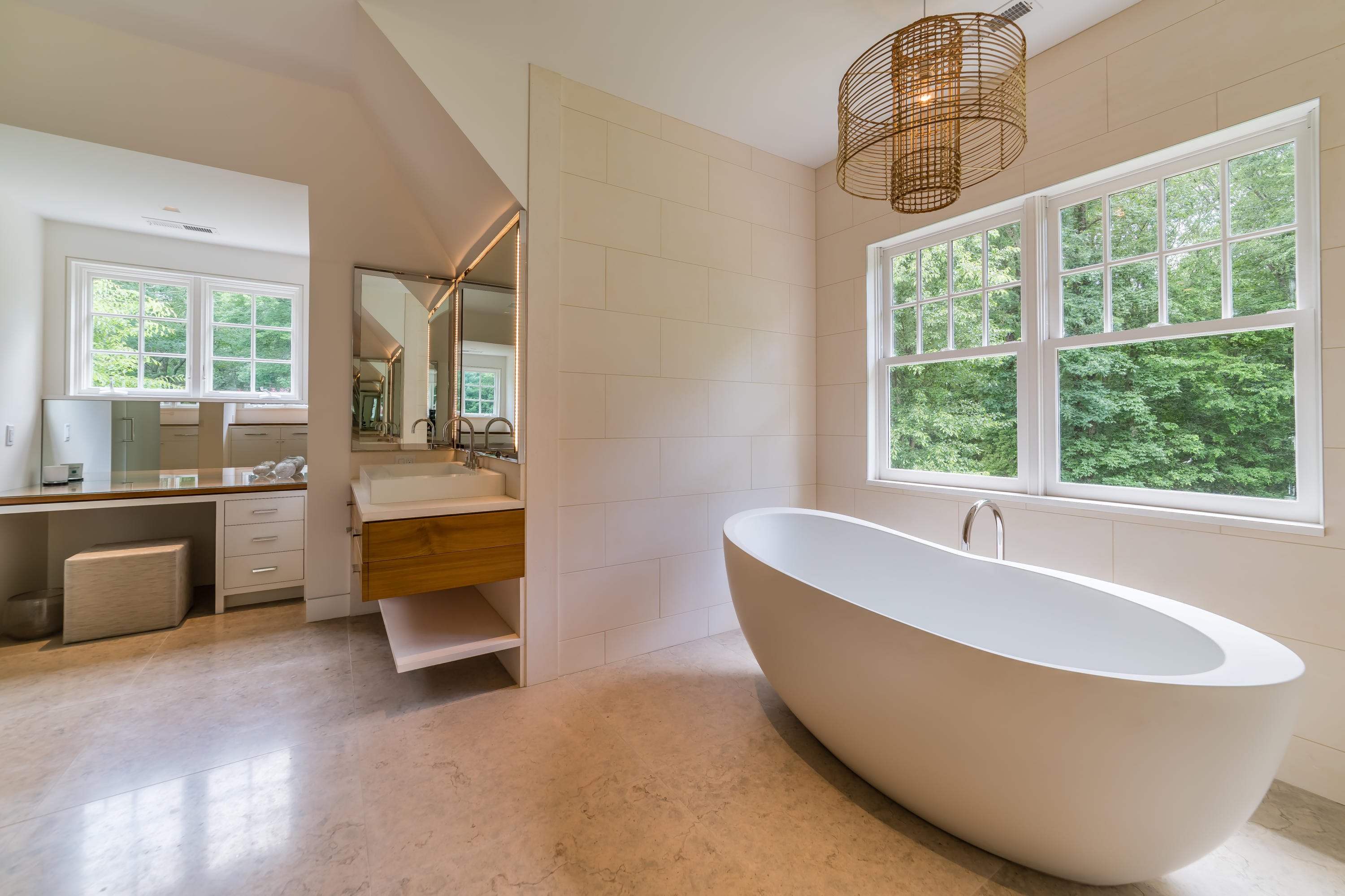 85 Lukes Wood Road New Canaan, CT 06840 - Photo 22 of 40 a living room with furniture and a large window