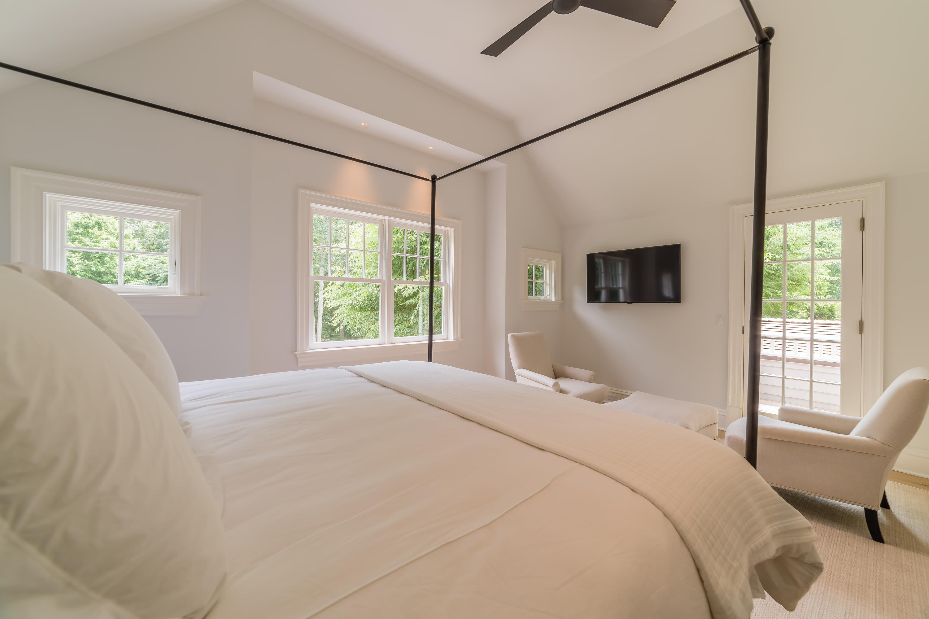 85 Lukes Wood Road New Canaan, CT 06840 - Photo 25 of 40 a bedroom with a bed and a window