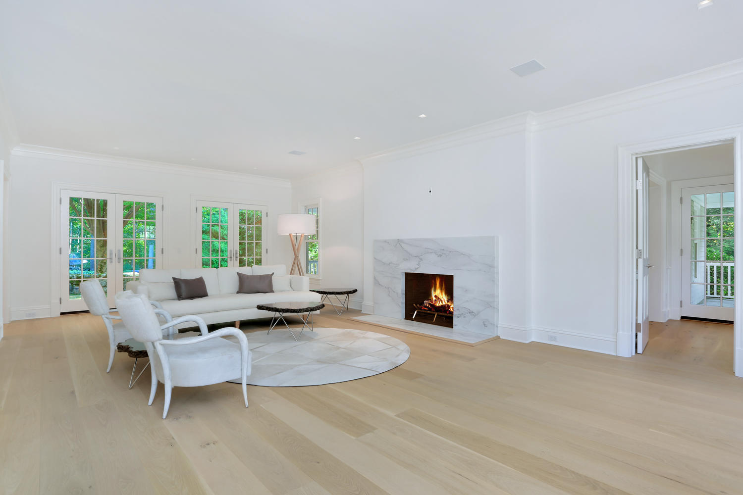85 Lukes Wood Road New Canaan, CT 06840 - Photo 5 of 40 a living room with furniture and a fireplace