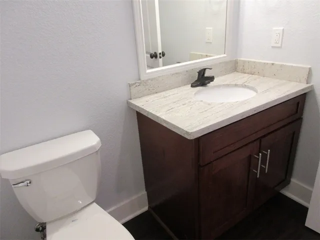 a bathroom with a sink and a toilet