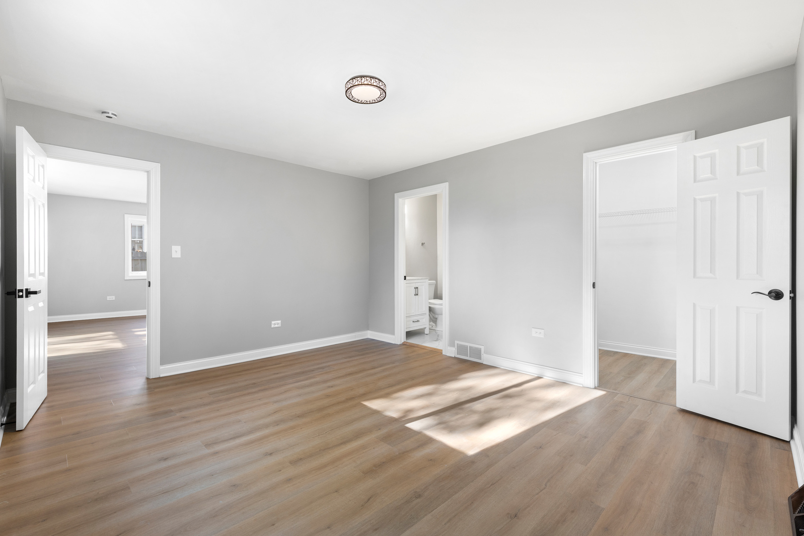 22 North 12th Street St. Charles, IL 60174 - Photo 15 of 37 a view of an empty room with wooden floor