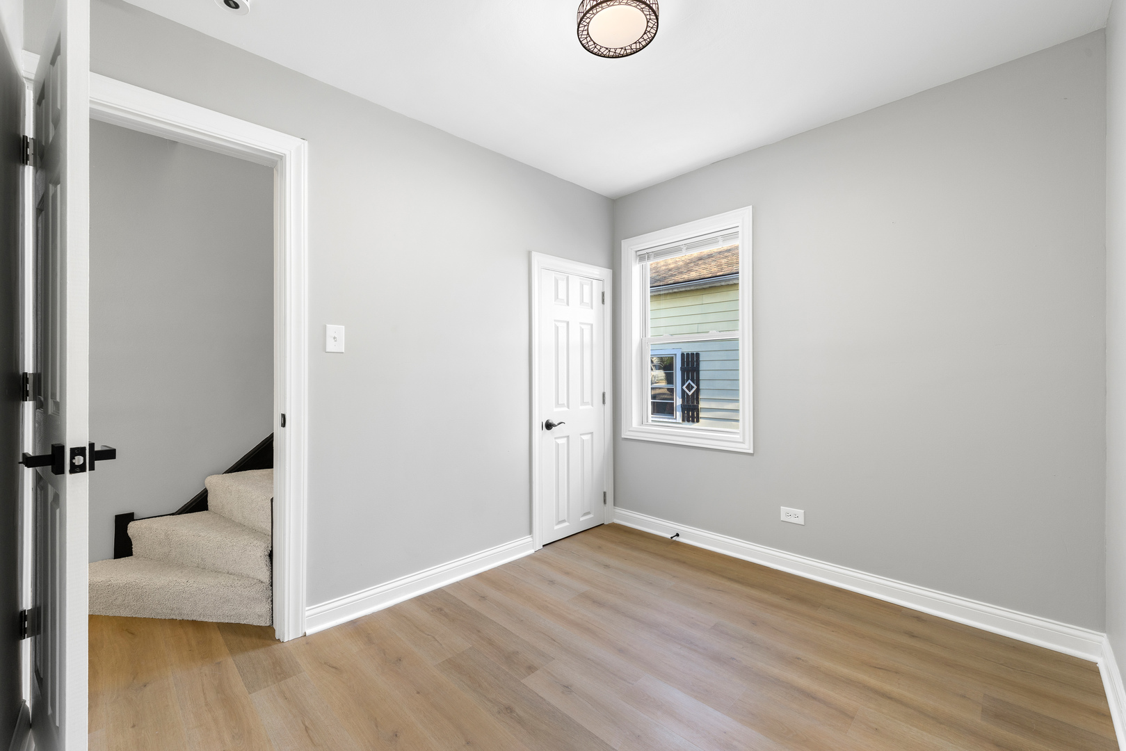 22 North 12th Street St. Charles, IL 60174 - Photo 24 of 37 a view of a livingroom with wooden floor
