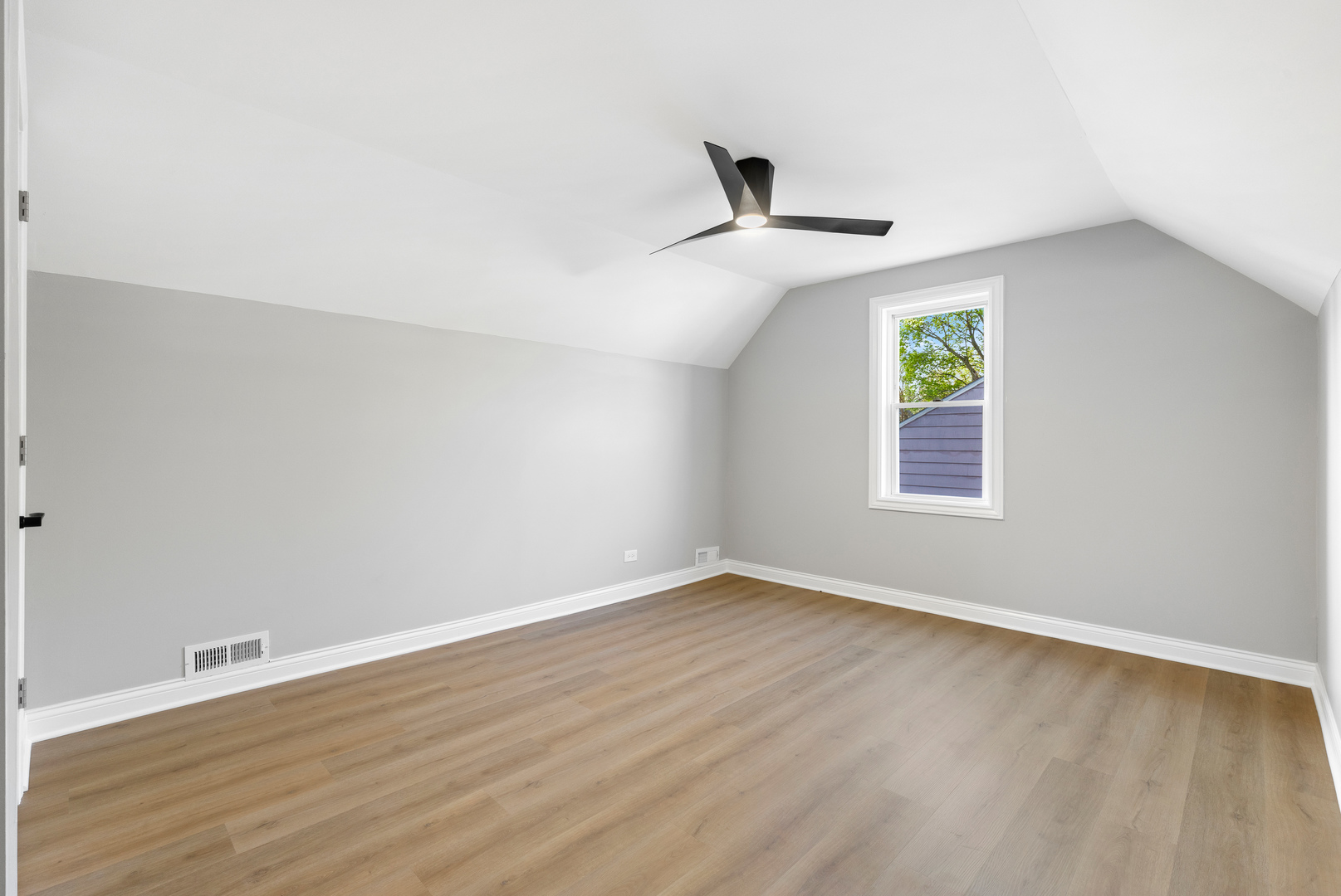 22 North 12th Street St. Charles, IL 60174 - Photo 27 of 37 wooden floor in an empty room with a window