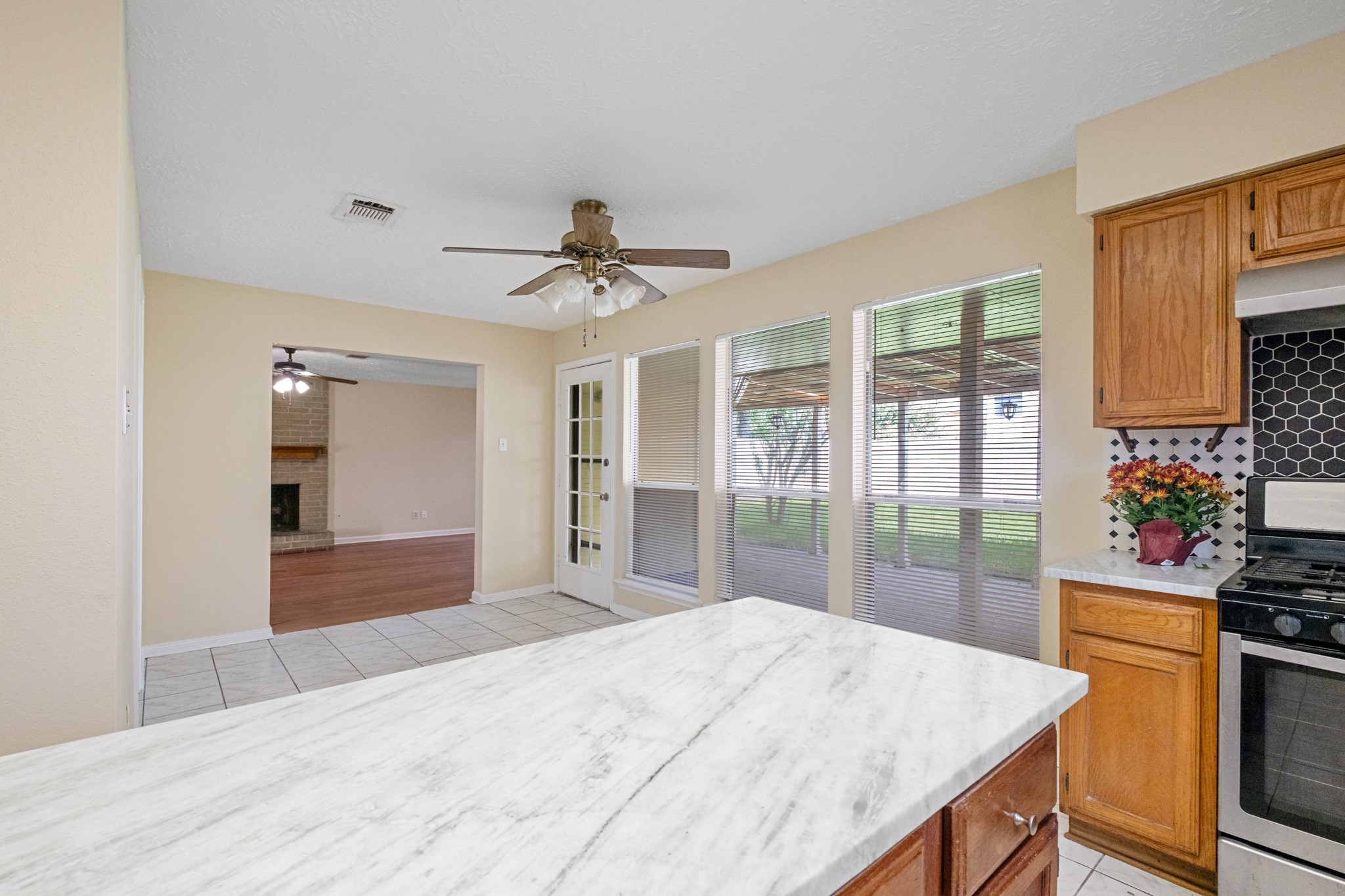 4131 Club Valley Drive Houston, TX 77082 - Photo 14 of 28 a bedroom with a bed and a large window with outer view