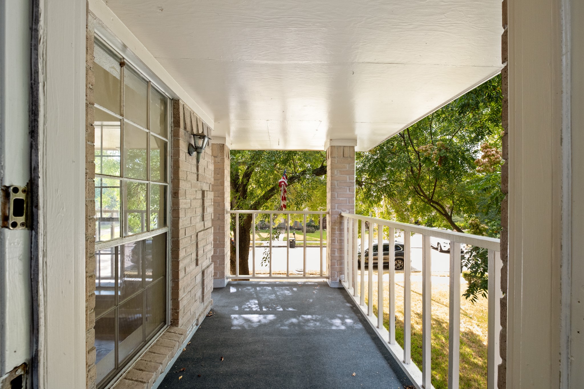 4131 Club Valley Drive Houston, TX 77082 - Photo 26 of 28 a view of a room with wooden floor and windows