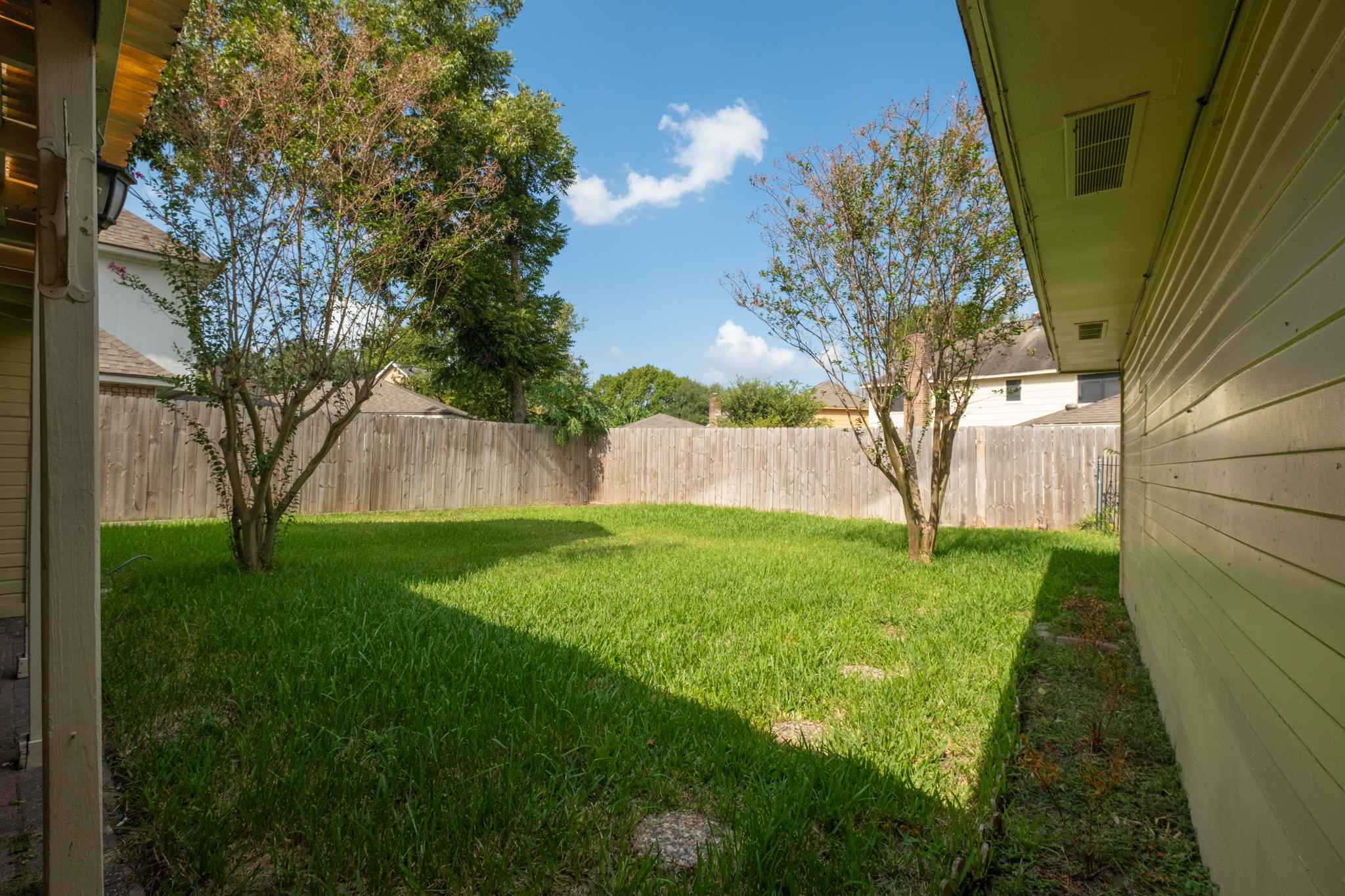 4131 Club Valley Drive Houston, TX 77082 - Photo 27 of 28 a view of backyard with tree