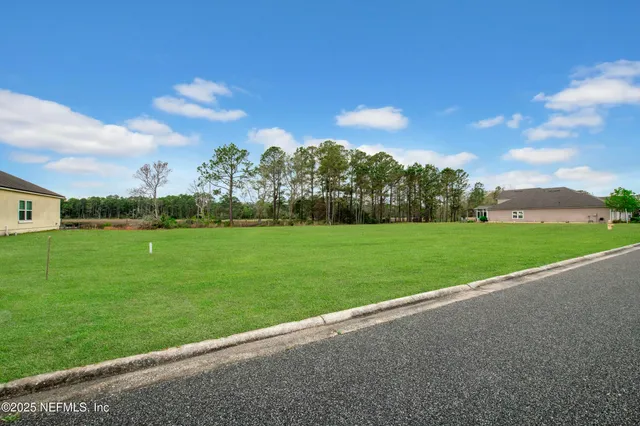 a view of a golf course with a garden