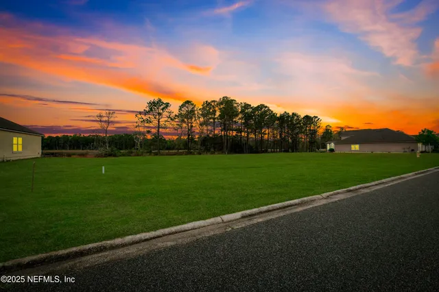 a view of a golf course with a garden