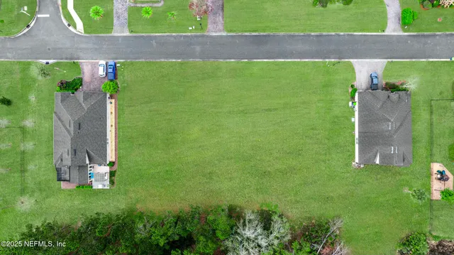 a view of a garden with a building