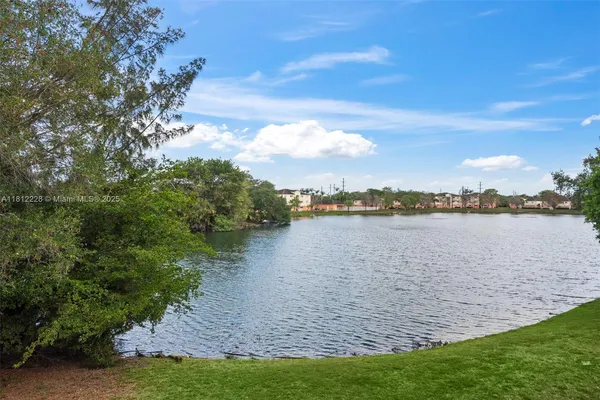 a view of a lake from a yard