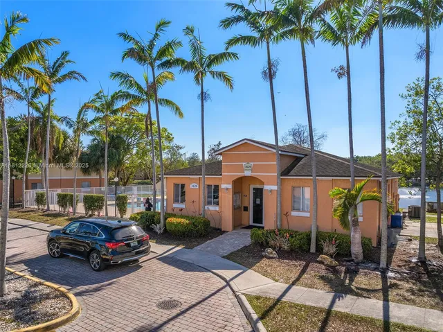 a car parked in front of a house